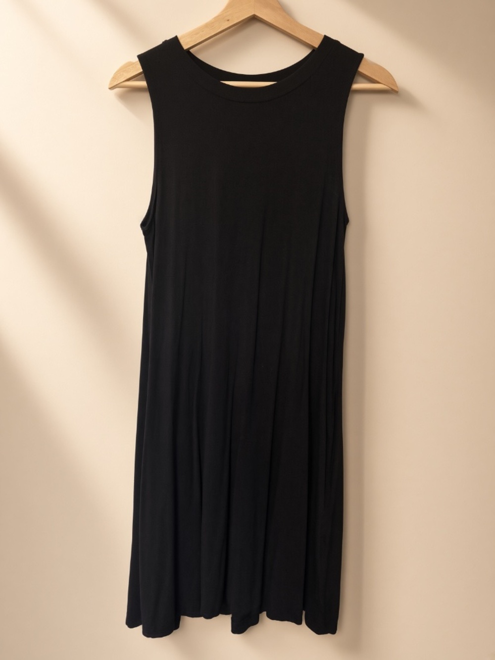 Black sleeveless swing dress
